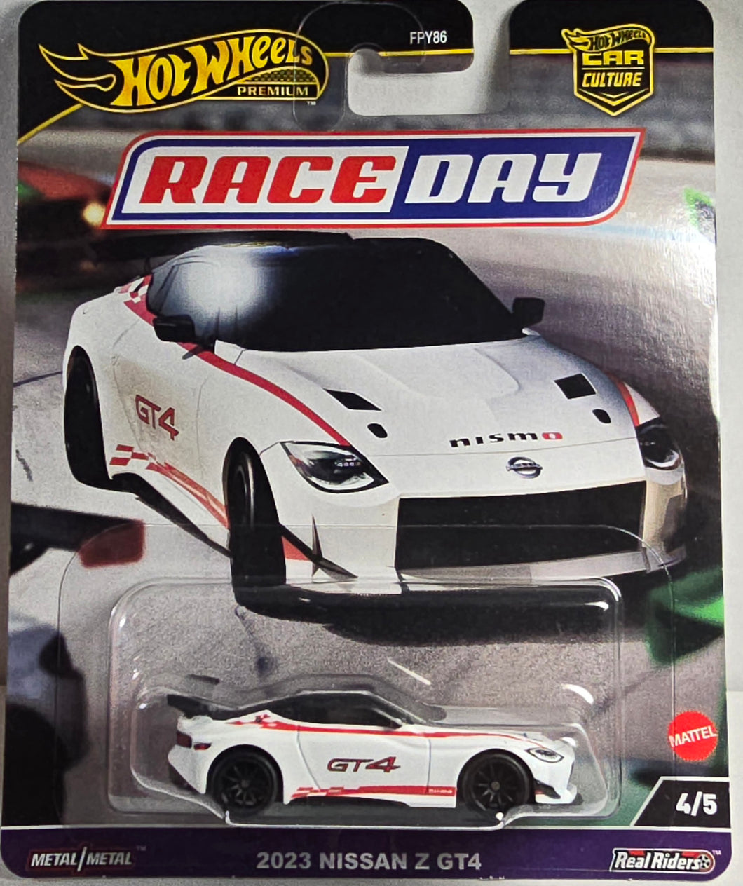 Hot Wheels 2023 Nissan Z GT4 car in packaging with 'Race Day' and 'Real Riders' branding.