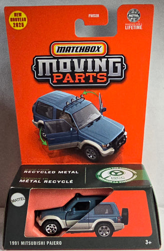 Matchbox toy car in packaging with orange background
