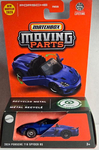 Matchbox Porsche 718 Spyder RS toy car in packaging with orange background